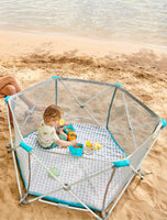 6-panel My Play Portable Play Yard® with Pad in the sand
