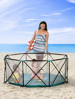 Children play inside Eight Panel My Play® Portable Play Yard at the beach
