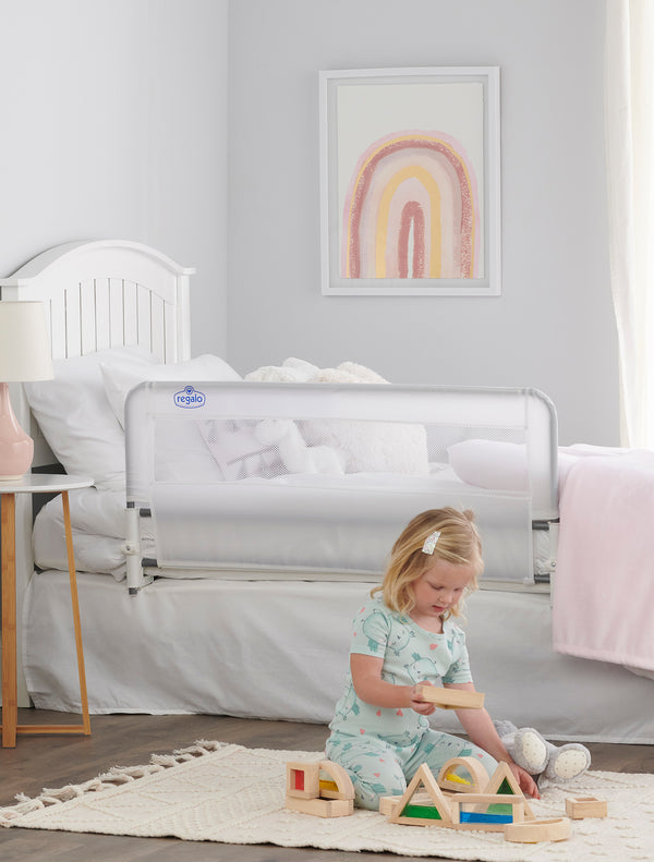 Child plays next to Easy Slide Bed Rail