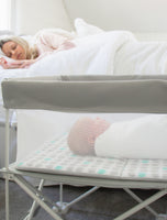 Baby sleeping in My Crib® Portable Bassinet