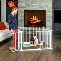 Mom watching toddler play in play yard