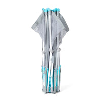 folded play yard on white background
