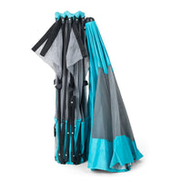 folded up play yard on white background