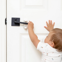 Toddler Reaching for Lever Door Lock