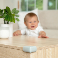 Close-up of Corner Cushion with Baby in the background