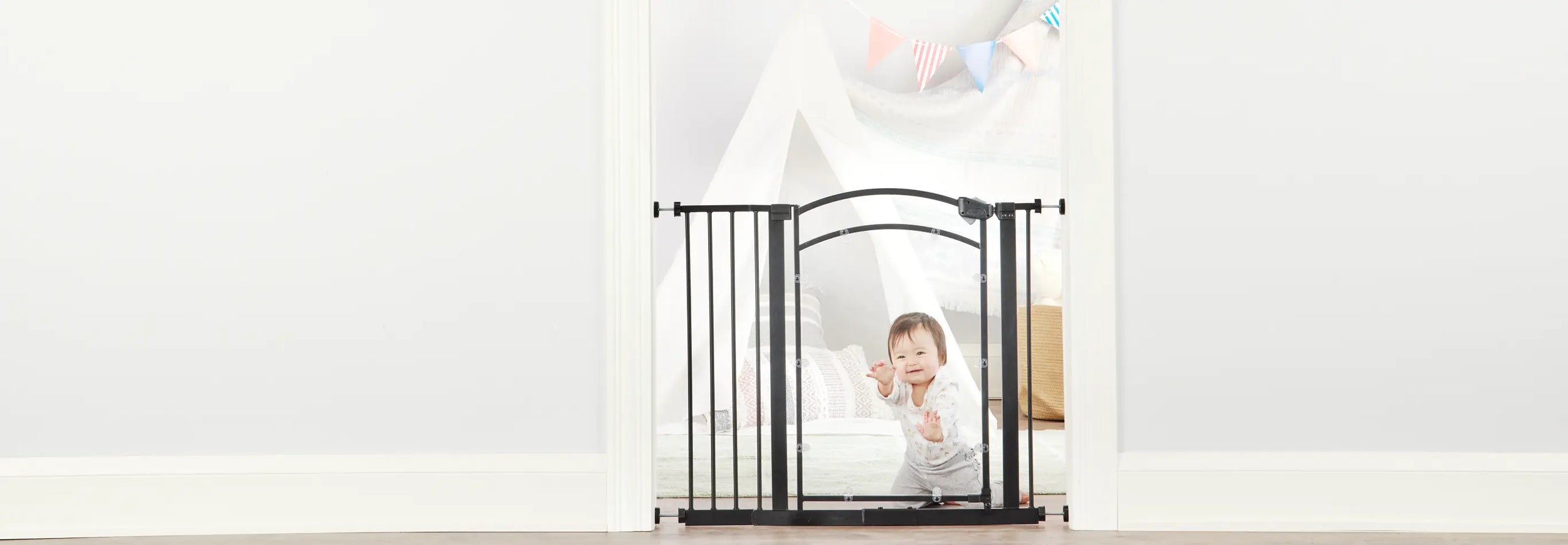 Baby Smiling Behind In Sight Safety Gate