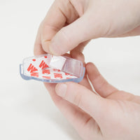 Peeling adhesive on Clear Corner Cushion
