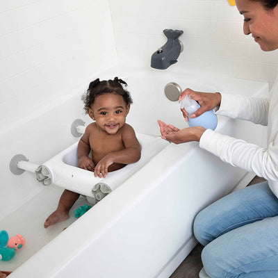 Happy child in Baby Basics™ Bath Seat