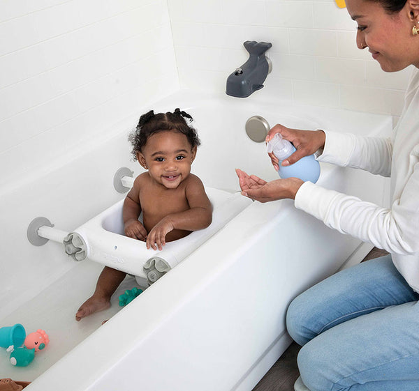 Happy child in Baby Basics™ Bath Seat