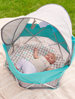 Baby resting in My Play Baby Portable Infant Bassinet