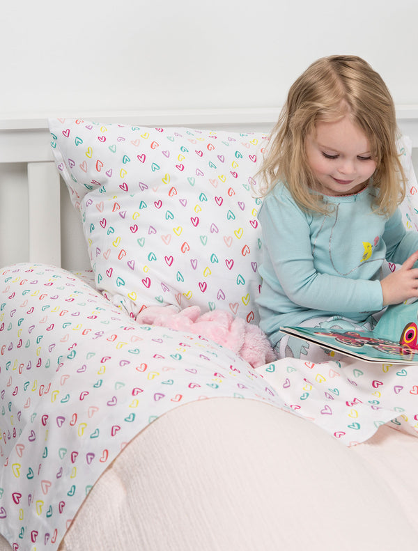 Child reads next to Single Foam Bed Bumper