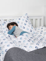 Child sleeps next to Double-Sided Foam Bed Bumper