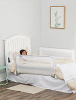 Child sleeps behind Double Sided Swing Down Bed Rail