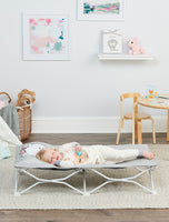 Child sleeps on Gray Polar Bear My Cot Pals Portable Toddler Bed