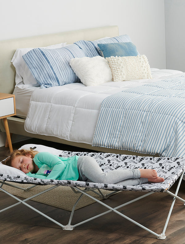 Child sleeps on My Cot Pals Extra Long Portable Toddler Bed