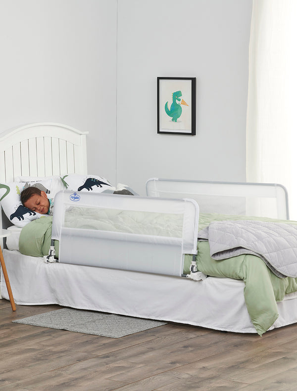 Child sleeps behind HideAway Double Sided Bed Rail