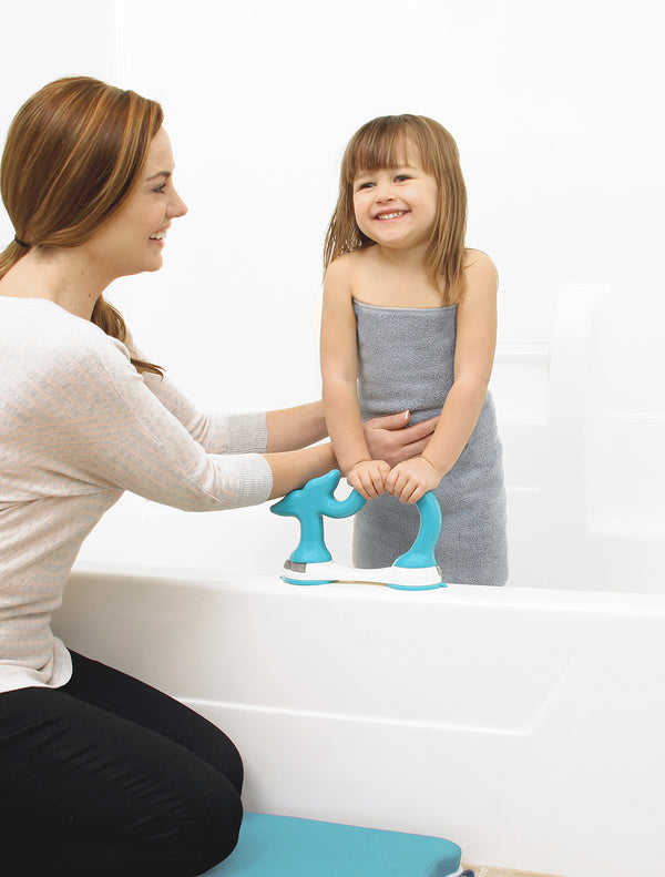 Child holds onto Bath Safety Hand Rail for Bathtub