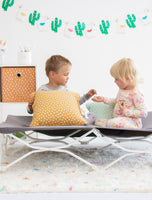 Children playing on My Cot® Twin Portable Toddler Bed™