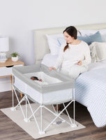Watching baby nap in My Crib® Portable Bassinet