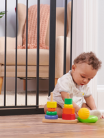 Baby plays by Home Accents® Extra Tall Designer Baby Gate
